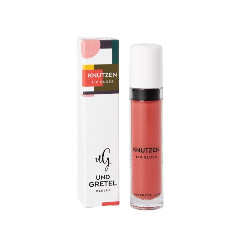 UND GRETEL KNUTZEN Lip Gloss 01 Matte Apricot, Verpackung und Flasche, auf weißem Hintergrund.