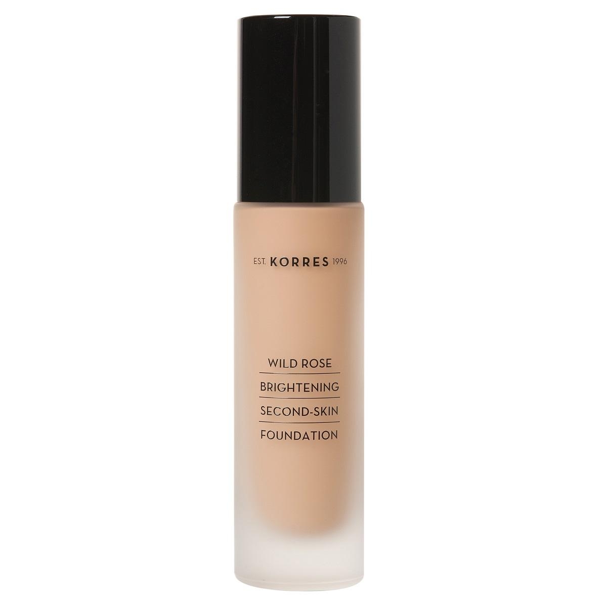 Korres Wild Rose Brightening Second-Skin Foundation in einer durchsichtigen Flasche mit schwarzem Deckel.